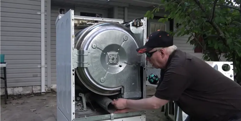 technician performing dryer vent cleaning in Rockford